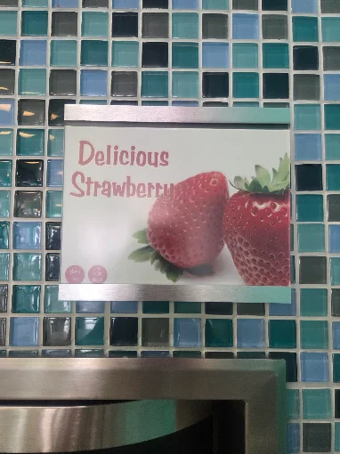 Delicious Strawberry flavor sign at the yogurt machines