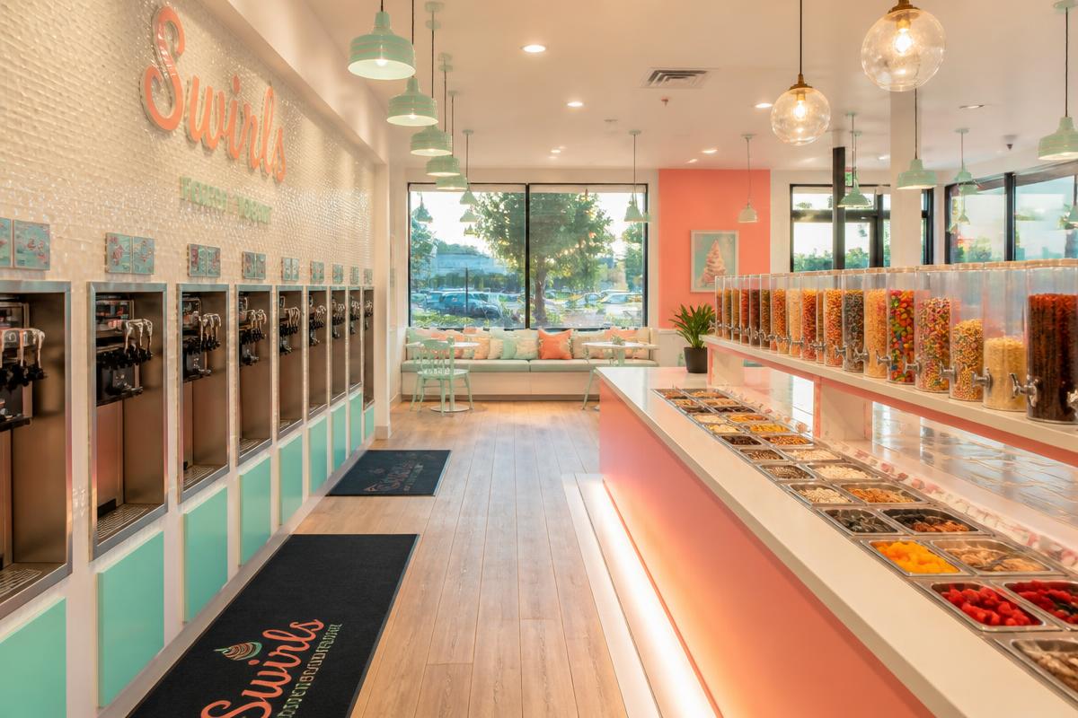 Bright and welcoming interior of Yogurt Yum frozen yogurt shop